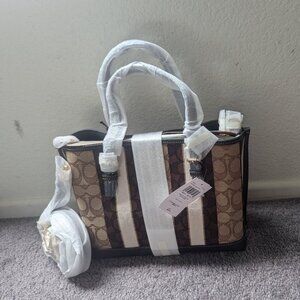 Jacquard Signature et cuir tanné à gant Poche avec fermeture éclair à l’intérieu